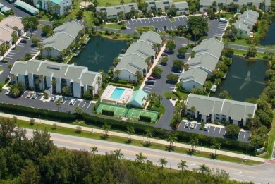 Peaceful pond view to enjoy your morning coffee from this on Ocean Village Golf Course in Florida - for sale on GolfHomes.com, golf home, golf lot