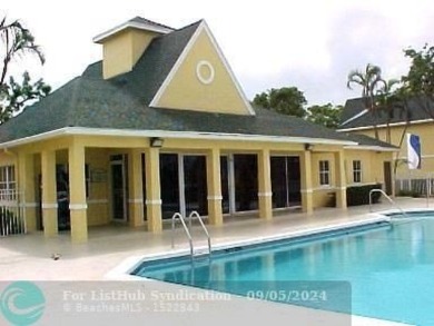 Stunning 2 Bedroom, 2 Bath Corner Unit in Breezes at Palm Aire! on Palm-Aire Country Club and Resort - Palms in Florida - for sale on GolfHomes.com, golf home, golf lot