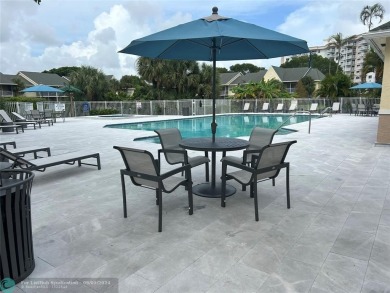 Stunning 2 Bedroom, 2 Bath Corner Unit in Breezes at Palm Aire! on Palm-Aire Country Club and Resort - Palms in Florida - for sale on GolfHomes.com, golf home, golf lot