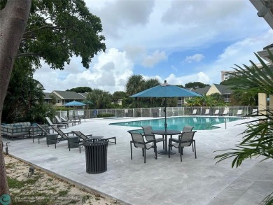 Stunning 2 Bedroom, 2 Bath Corner Unit in Breezes at Palm Aire! on Palm-Aire Country Club and Resort - Palms in Florida - for sale on GolfHomes.com, golf home, golf lot