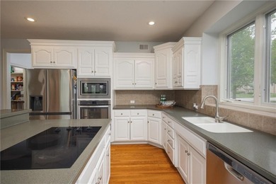 Stunning golf course living awaits in this spacious 5-bedroom, 4 on Falcon Lakes Golf Course in Kansas - for sale on GolfHomes.com, golf home, golf lot