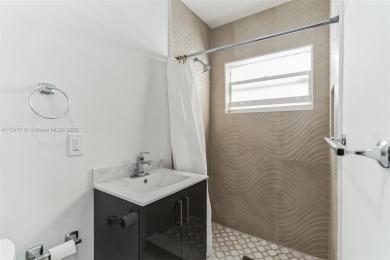 Newly renovated 4 bedroom, 3 bathroom home in the very on Miami Springs Golf and Country Club in Florida - for sale on GolfHomes.com, golf home, golf lot