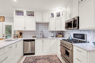 Can you imagine owning this elegant 3 BR/2 BA home set on 3/4 on Diamondhead Country Club in Mississippi - for sale on GolfHomes.com, golf home, golf lot