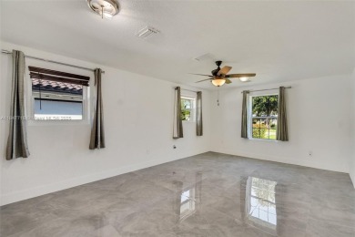 Newly renovated 4 bedroom, 3 bathroom home in the very on Miami Springs Golf and Country Club in Florida - for sale on GolfHomes.com, golf home, golf lot