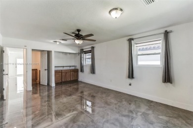 Newly renovated 4 bedroom, 3 bathroom home in the very on Miami Springs Golf and Country Club in Florida - for sale on GolfHomes.com, golf home, golf lot