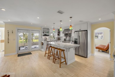 Beautifully updated 3 bed, 2 bath waterfront home with on New Smyrna Beach Golf Course in Florida - for sale on GolfHomes.com, golf home, golf lot