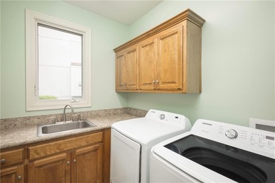 Stunning golf course living awaits in this spacious 5-bedroom, 4 on Falcon Lakes Golf Course in Kansas - for sale on GolfHomes.com, golf home, golf lot