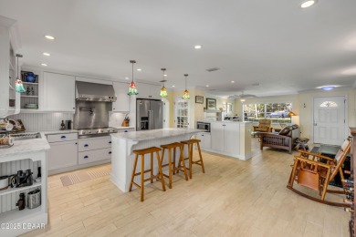 Beautifully updated 3 bed, 2 bath waterfront home with on New Smyrna Beach Golf Course in Florida - for sale on GolfHomes.com, golf home, golf lot