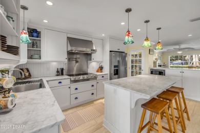 Beautifully updated 3 bed, 2 bath waterfront home with on New Smyrna Beach Golf Course in Florida - for sale on GolfHomes.com, golf home, golf lot