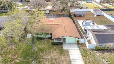 Located on a quiet cul-de-sac in the heart of Forest Hills, this on Babe Zaharias Golf Course in Florida - for sale on GolfHomes.com, golf home, golf lot