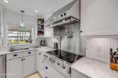 Beautifully updated 3 bed, 2 bath waterfront home with on New Smyrna Beach Golf Course in Florida - for sale on GolfHomes.com, golf home, golf lot