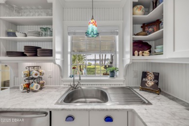 Beautifully updated 3 bed, 2 bath waterfront home with on New Smyrna Beach Golf Course in Florida - for sale on GolfHomes.com, golf home, golf lot