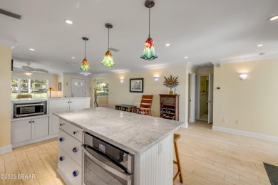 Beautifully updated 3 bed, 2 bath waterfront home with on New Smyrna Beach Golf Course in Florida - for sale on GolfHomes.com, golf home, golf lot