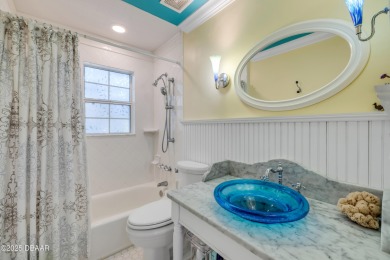 Beautifully updated 3 bed, 2 bath waterfront home with on New Smyrna Beach Golf Course in Florida - for sale on GolfHomes.com, golf home, golf lot