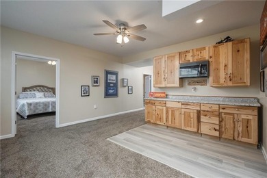 Stunning golf course living awaits in this spacious 5-bedroom, 4 on Falcon Lakes Golf Course in Kansas - for sale on GolfHomes.com, golf home, golf lot