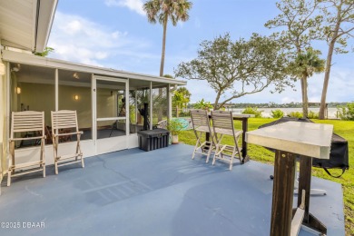 Beautifully updated 3 bed, 2 bath waterfront home with on New Smyrna Beach Golf Course in Florida - for sale on GolfHomes.com, golf home, golf lot