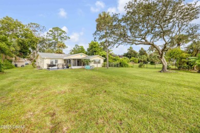 Beautifully updated 3 bed, 2 bath waterfront home with on New Smyrna Beach Golf Course in Florida - for sale on GolfHomes.com, golf home, golf lot