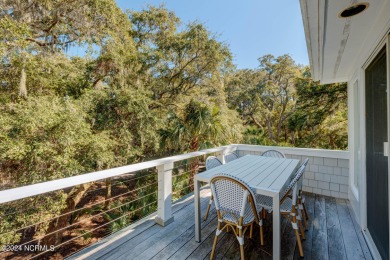 COASTAL HAVEN! Nestled in a grove of breathtaking palm trees in on Bald Head Island Golf Club in North Carolina - for sale on GolfHomes.com, golf home, golf lot