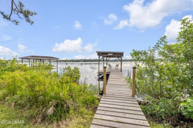 Beautifully updated 3 bed, 2 bath waterfront home with on New Smyrna Beach Golf Course in Florida - for sale on GolfHomes.com, golf home, golf lot