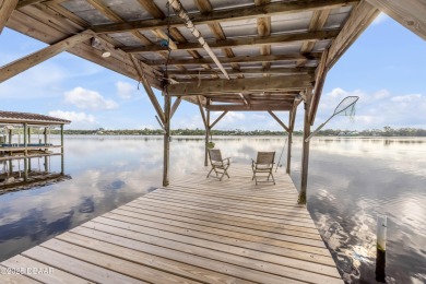 Beautifully updated 3 bed, 2 bath waterfront home with on New Smyrna Beach Golf Course in Florida - for sale on GolfHomes.com, golf home, golf lot