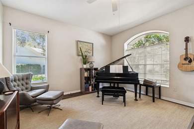 Step into this beautifully updated 4-bedroom, 2-bath home in the on Tampa Palms Golf and Country Club in Florida - for sale on GolfHomes.com, golf home, golf lot