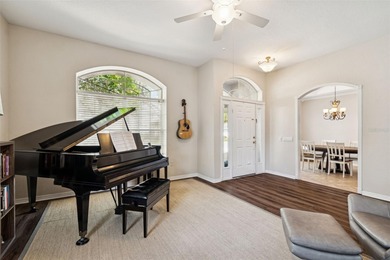 Step into this beautifully updated 4-bedroom, 2-bath home in the on Tampa Palms Golf and Country Club in Florida - for sale on GolfHomes.com, golf home, golf lot