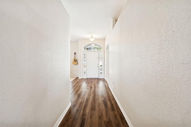 Step into this beautifully updated 4-bedroom, 2-bath home in the on Tampa Palms Golf and Country Club in Florida - for sale on GolfHomes.com, golf home, golf lot