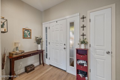 This beautifully updated 3-bedroom, 2-bathroom residence on Quail Wood Greens Golf Course in Arizona - for sale on GolfHomes.com, golf home, golf lot