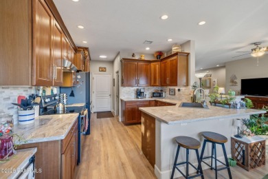 This beautifully updated 3-bedroom, 2-bathroom residence on Quail Wood Greens Golf Course in Arizona - for sale on GolfHomes.com, golf home, golf lot