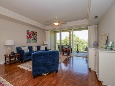 Elegant Country Club living in this second floor condo built by on Oak Harbor Country Club in Florida - for sale on GolfHomes.com, golf home, golf lot