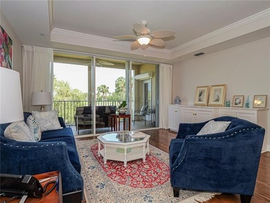 Elegant Country Club living in this second floor condo built by on Oak Harbor Country Club in Florida - for sale on GolfHomes.com, golf home, golf lot