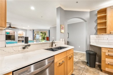 STUNNING FULLY FURNISHED 3 BEDROOM CONDO IN RESORT STYLED on Oak Harbor Country Club in Florida - for sale on GolfHomes.com, golf home, golf lot