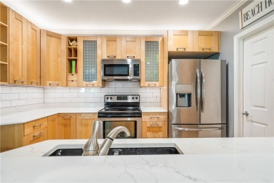 STUNNING FULLY FURNISHED 3 BEDROOM CONDO IN RESORT STYLED on Oak Harbor Country Club in Florida - for sale on GolfHomes.com, golf home, golf lot