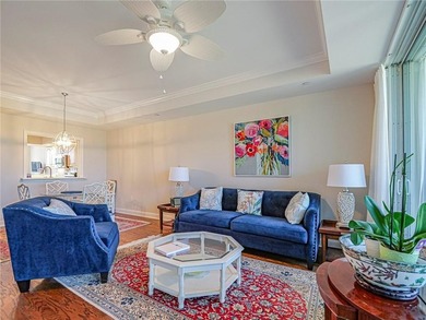 Elegant Country Club living in this second floor condo built by on Oak Harbor Country Club in Florida - for sale on GolfHomes.com, golf home, golf lot