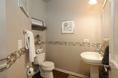 Discover elegance and the perfect home for entertaining in this on Boulder Ridge Country Club in Illinois - for sale on GolfHomes.com, golf home, golf lot