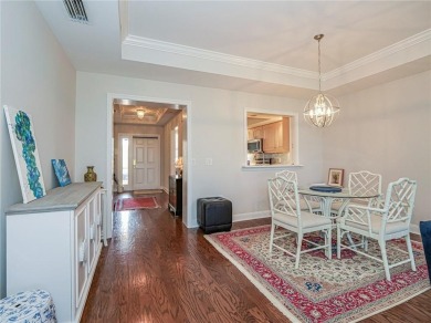 Elegant Country Club living in this second floor condo built by on Oak Harbor Country Club in Florida - for sale on GolfHomes.com, golf home, golf lot