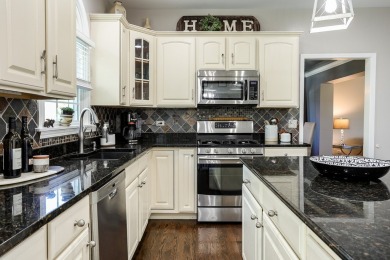 Discover elegance and the perfect home for entertaining in this on Boulder Ridge Country Club in Illinois - for sale on GolfHomes.com, golf home, golf lot