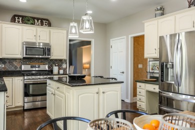 Discover elegance and the perfect home for entertaining in this on Boulder Ridge Country Club in Illinois - for sale on GolfHomes.com, golf home, golf lot
