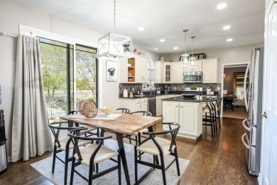 Discover elegance and the perfect home for entertaining in this on Boulder Ridge Country Club in Illinois - for sale on GolfHomes.com, golf home, golf lot