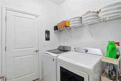 BARELY LIVED IN Lennar Alexander model located in the heart of on Babcock National Golf Course in Florida - for sale on GolfHomes.com, golf home, golf lot