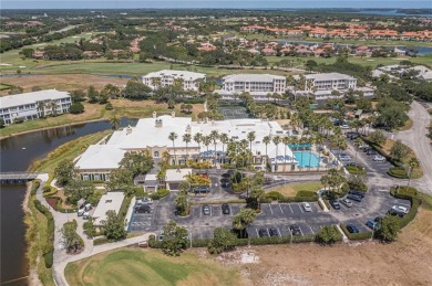 Elegant Country Club living in this second floor condo built by on Oak Harbor Country Club in Florida - for sale on GolfHomes.com, golf home, golf lot
