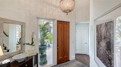 Two-level penthouse residences at Tangerine Bay Club are rarely on Links on Longboat Golf Club in Florida - for sale on GolfHomes.com, golf home, golf lot