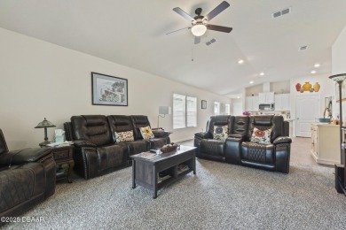 Discover your dream home in this incredible four-bedroom gem on Grand Reserve Golf Course in Florida - for sale on GolfHomes.com, golf home, golf lot