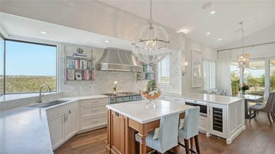 Two-level penthouse residences at Tangerine Bay Club are rarely on Links on Longboat Golf Club in Florida - for sale on GolfHomes.com, golf home, golf lot