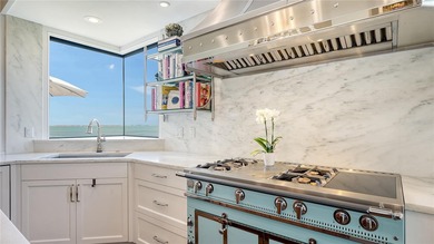 Two-level penthouse residences at Tangerine Bay Club are rarely on Links on Longboat Golf Club in Florida - for sale on GolfHomes.com, golf home, golf lot