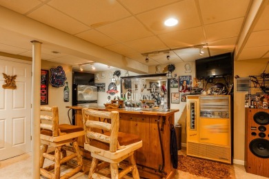 Discover elegance and the perfect home for entertaining in this on Boulder Ridge Country Club in Illinois - for sale on GolfHomes.com, golf home, golf lot