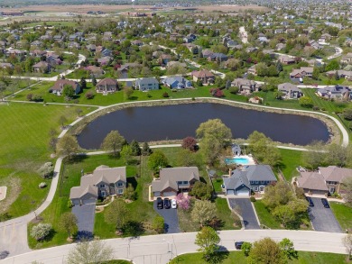 Discover elegance and the perfect home for entertaining in this on Boulder Ridge Country Club in Illinois - for sale on GolfHomes.com, golf home, golf lot