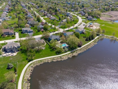 Discover elegance and the perfect home for entertaining in this on Boulder Ridge Country Club in Illinois - for sale on GolfHomes.com, golf home, golf lot