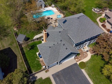 Discover elegance and the perfect home for entertaining in this on Boulder Ridge Country Club in Illinois - for sale on GolfHomes.com, golf home, golf lot