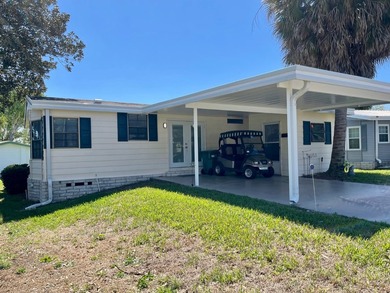 This home comes complete and with a Golf Cart!! Just bring your on Water Oak Country Club Estates in Florida - for sale on GolfHomes.com, golf home, golf lot